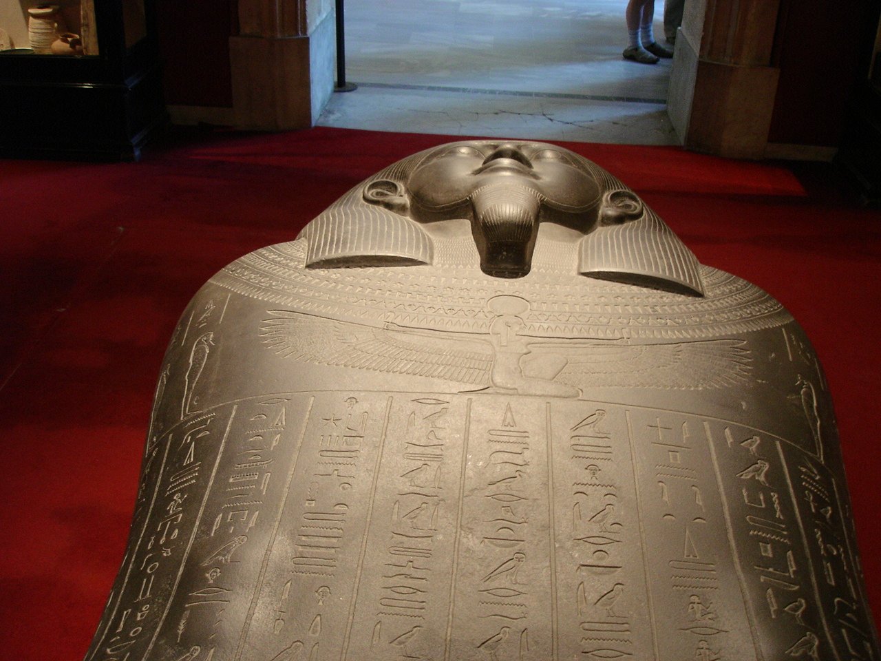 The sarcophagus lying on a red plinth in a gallery of the Istanbul Archaeology Museums
